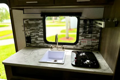 Cozy Coleman Lantern Travel Trailer