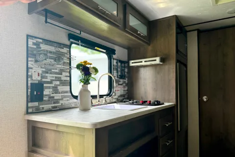 Cozy Coleman Lantern Travel Trailer