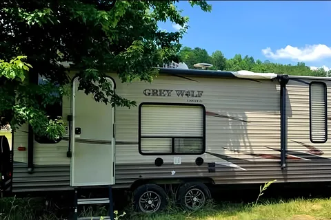 Tahi Healing - Forest River Cherokee Grey Wolf Travel Trailer