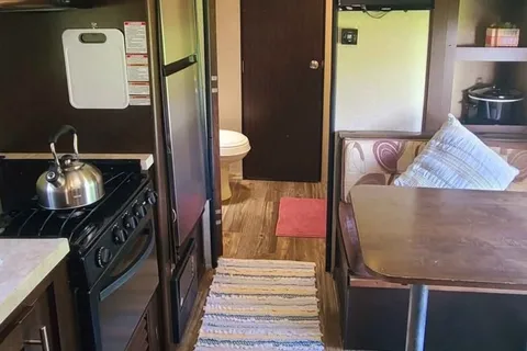 Tahi Healing - Forest River Cherokee Grey Wolf Travel Trailer