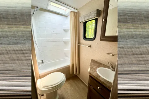 Perfect Family Trailer: Rockwood Minilite with Queen Murphy Bed and Double-size Bunks