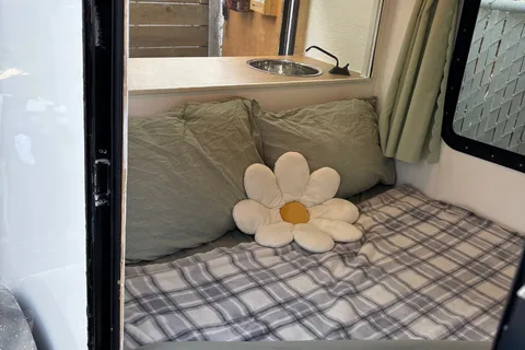 Spacious Square-Drop trailer with a small kitchen
