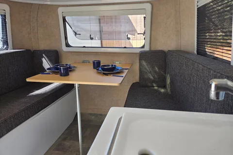 Brooke's cozy Scamp 13 ft Trailer