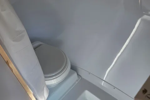 Brooke's cozy Scamp 13 ft Trailer