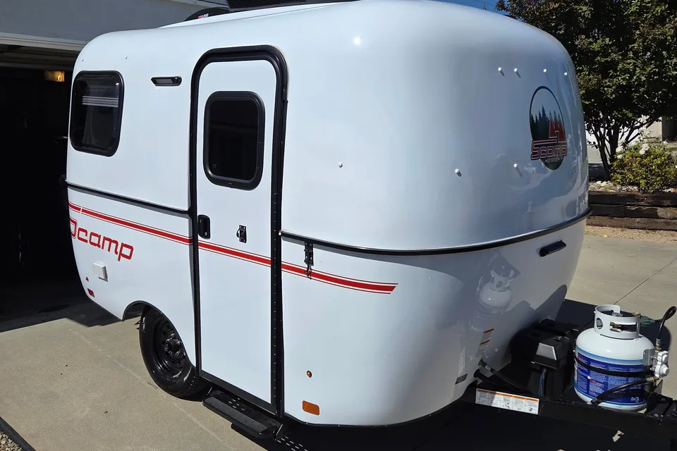 Brooke's cozy Scamp 13 ft Trailer