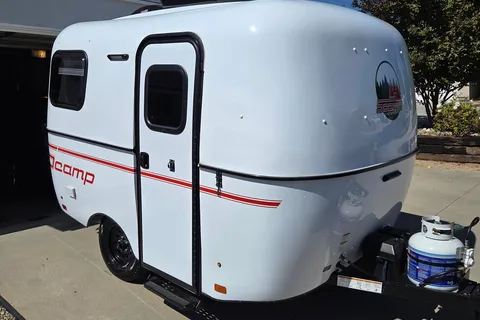 Brooke's cozy Scamp 13 ft Trailer