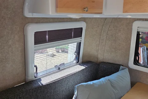 Brooke's cozy Scamp 13 ft Trailer