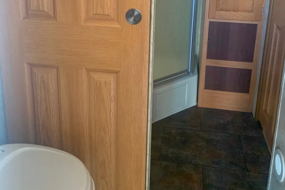 Perfect getaway keystone hideout rv there yet seperate bathroom entrance easier for the kids to stay sleeping !!
