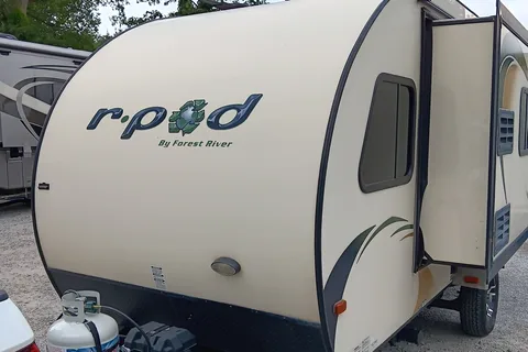 Earl 's Forest River  R POD Micro Trailer with Slider for more room.