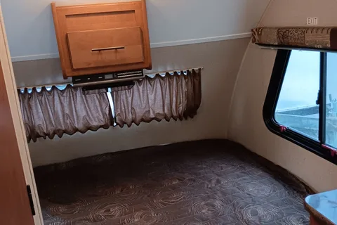 Earl 's Forest River  R POD Micro Trailer with Slider for more room.