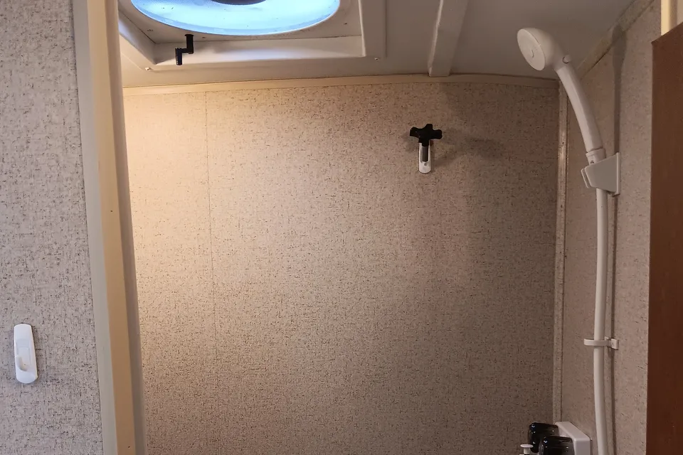 Earl 's Forest River  R POD Micro Trailer with Slider for more room.