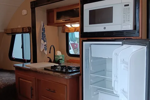 Earl 's Forest River  R POD Micro Trailer with Slider for more room.