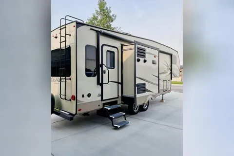 We deliver!  Julie and Tim's Rockwood Forest River Fifth Wheel