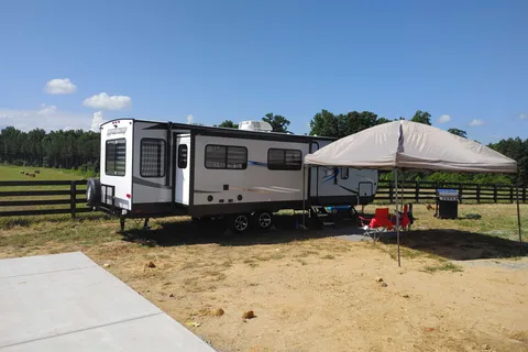 Matt and Shannon Forest River Alpha Wolf 26RL-L Travel Trailer