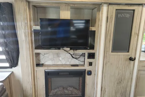 Matt and Shannon Forest River Alpha Wolf 26RL-L Travel Trailer