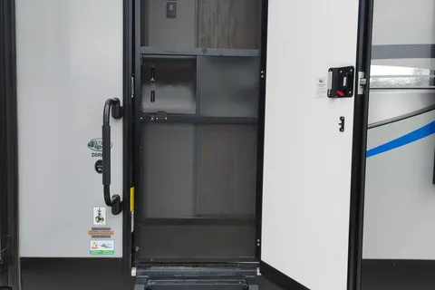 Matt and Shannon Forest River Alpha Wolf 26RL-L Travel Trailer
