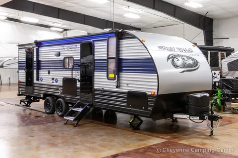 Blair and Carly's 29 ft Grey Wolf Travel Trailer with bunks and slide out