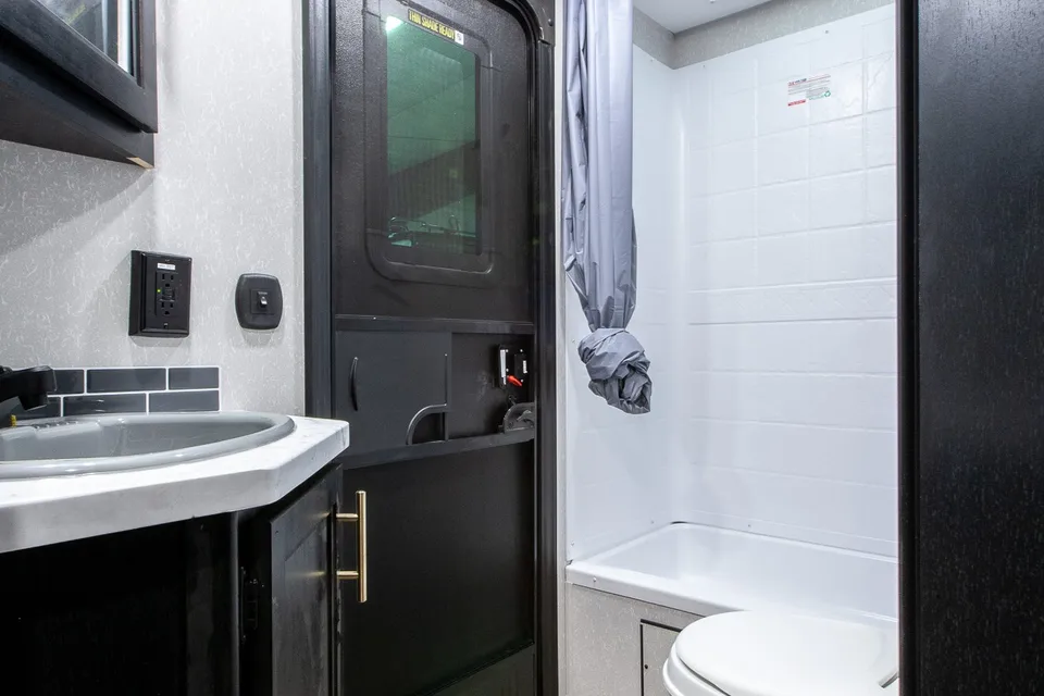 Blair and Carly's 29 ft Grey Wolf Travel Trailer with bunks and slide out
