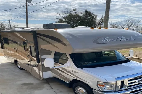 Chuck and Tammy’s Four Winds 22E Class C