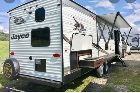 Family fun, rain or shine: Queen bed in private room, full size bunk beds, 50 inch TV, outdoor shower, BBQ & fridge